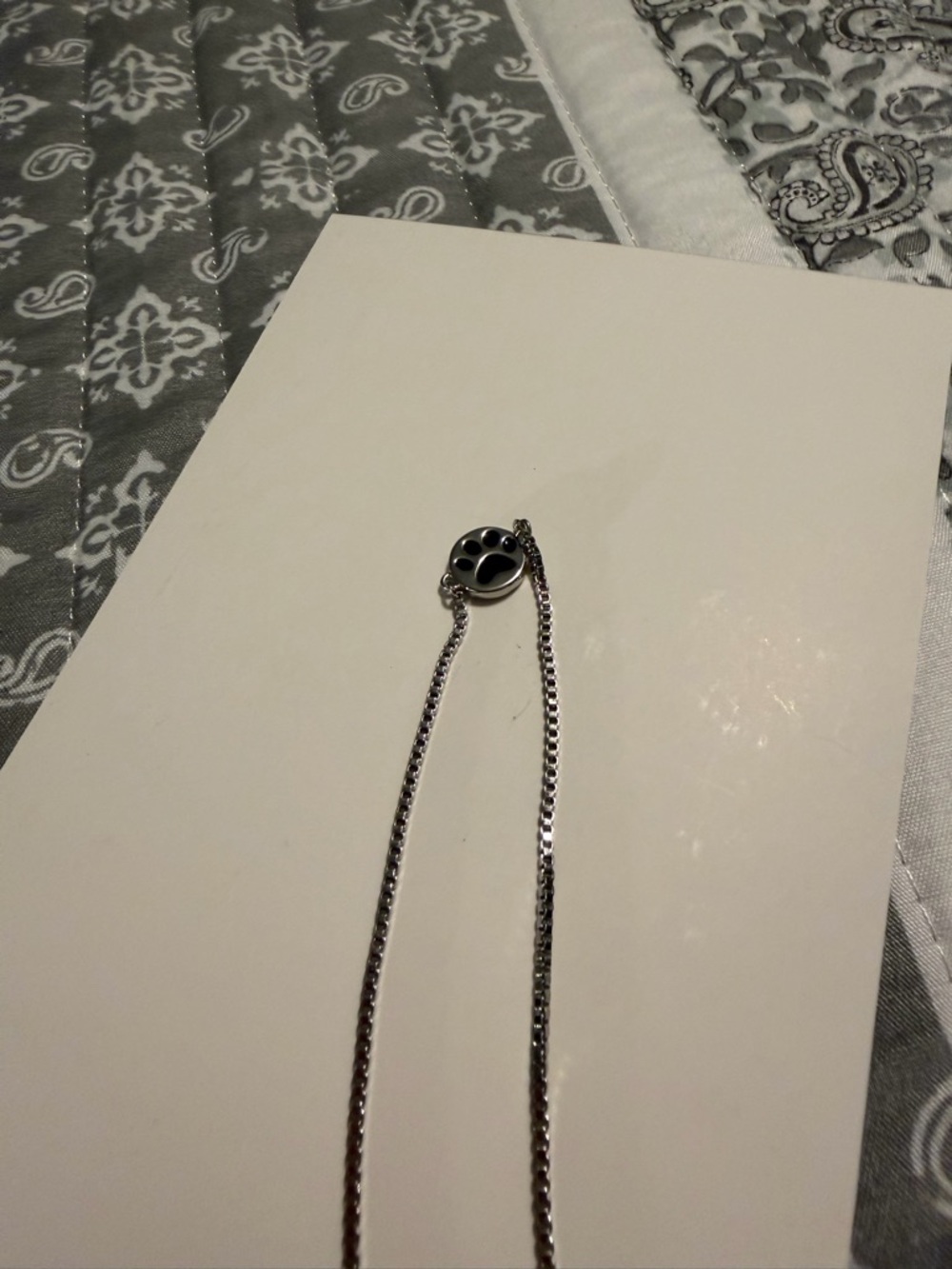 Park Lane Silver Paw Print Bracelet with Black Enamel Detail